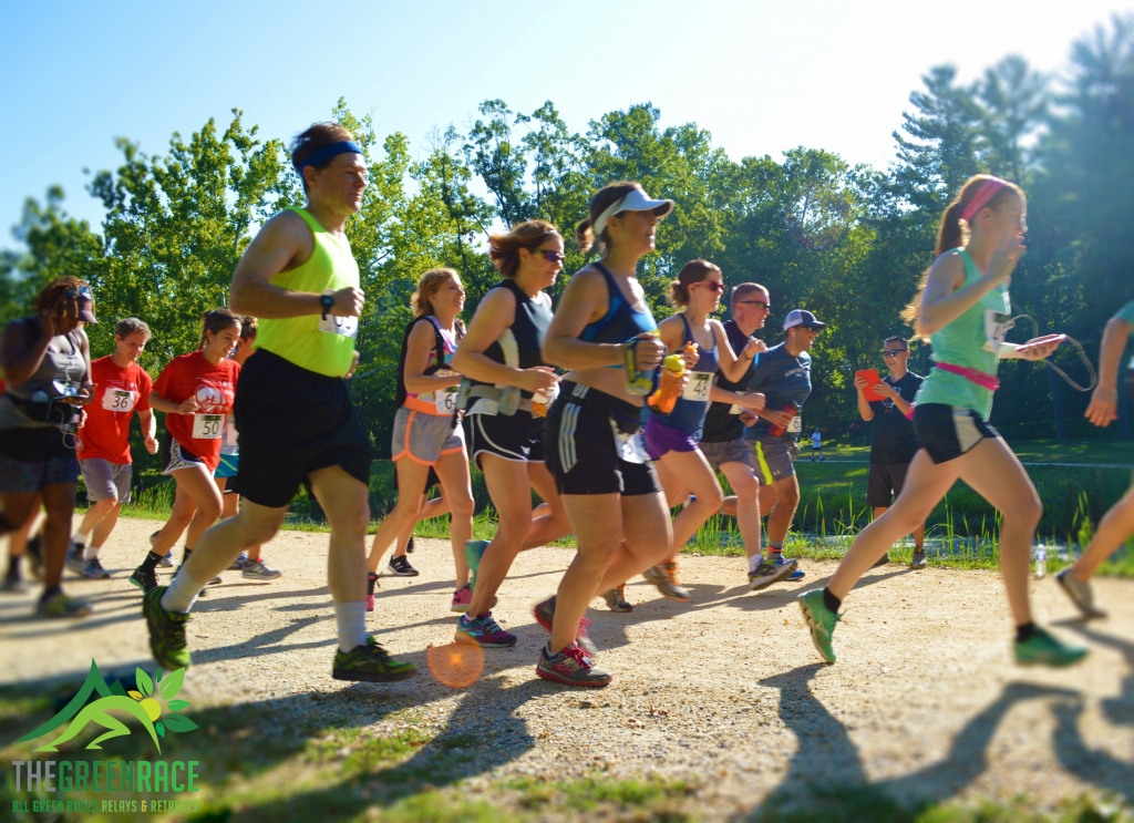 Runners leaving the start line of a trail race